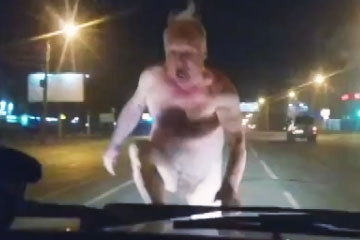 Furious Naked Man Attacks Volvo